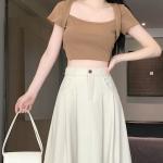 Mikiko - Jupe trapèze mi-longue fendue unie à taille haute