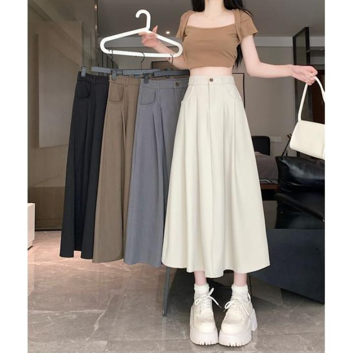 Mikiko - Jupe trapèze mi-longue fendue unie à taille haute